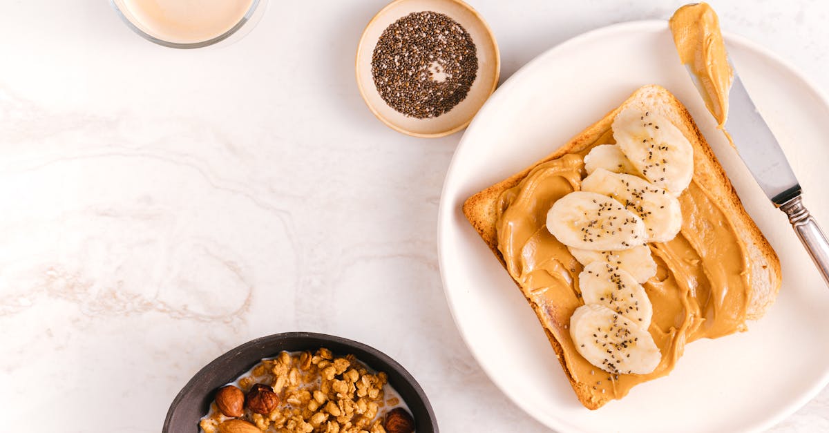 flat lay of a nutritious breakfast featuring banana toast chia seeds and nuts on a marble surface 34