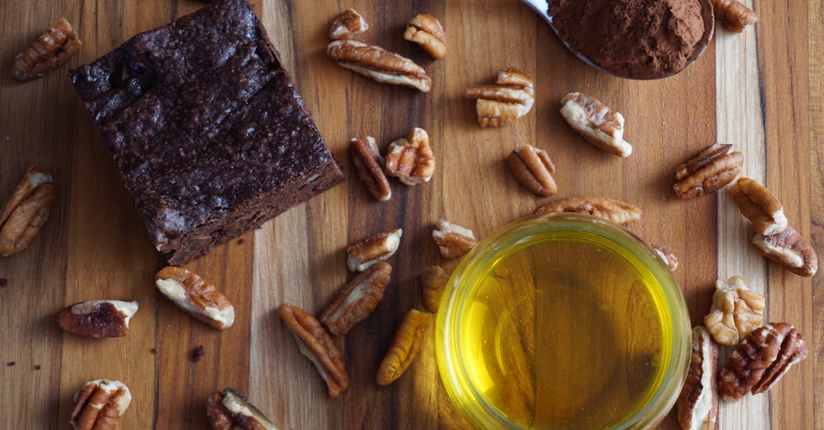 flat lay of homemade chocolate brownie with pecans cocoa and oil perfect for baking visuals