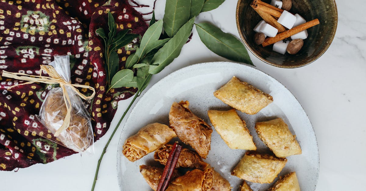 flat lay of pastries with cinnamon and herbs evoking a warm seasonal feel
