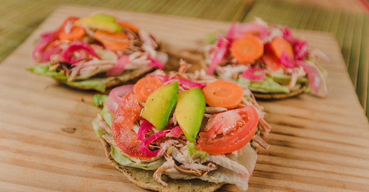 freshly made avocado and vegetable tostadas on a wooden board ideal for healthy meals 1
