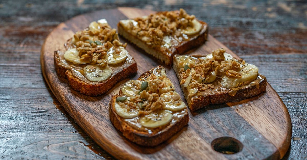 freshly prepared banana granola toasts on a rustic wooden board perfect for breakfast or a sweet sn