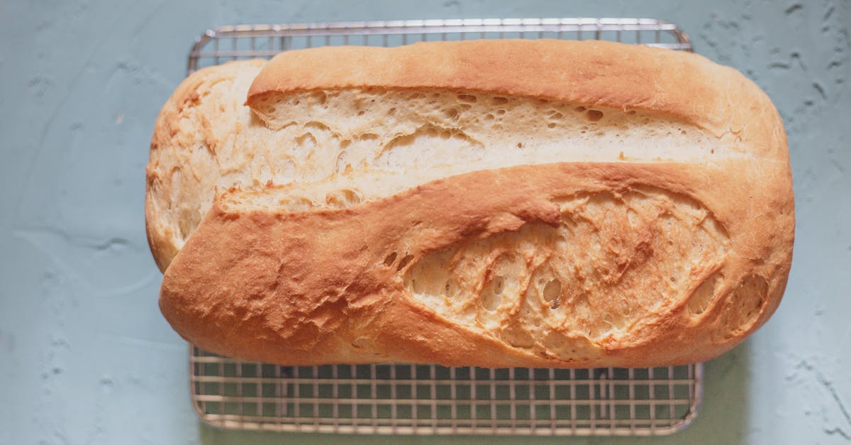 golden brown homemade bread loaf cooling on a wire rack ready to serve and enjoy 1
