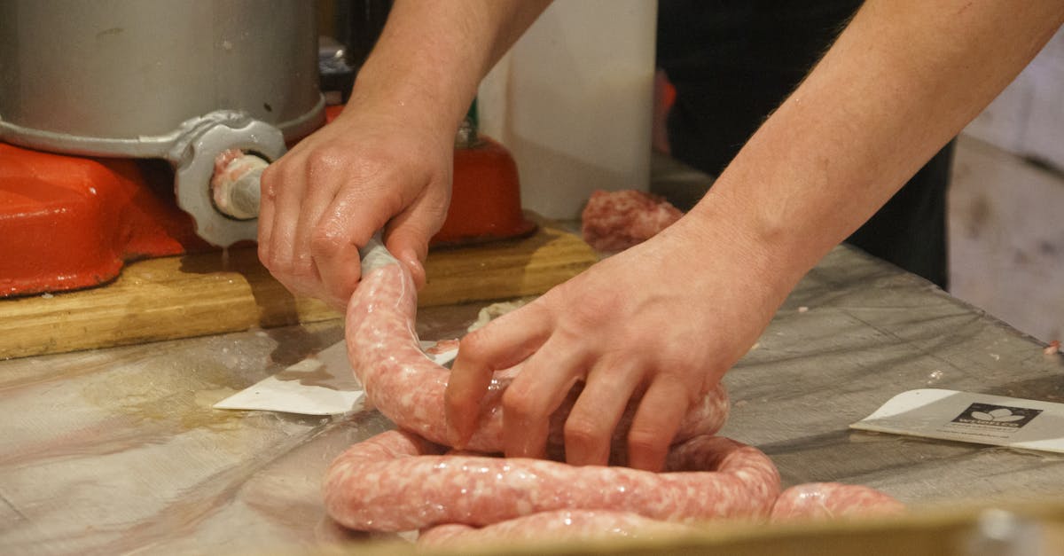 hands crafting sausages in a traditional kitchen setup authentic culinary skills showcase 4