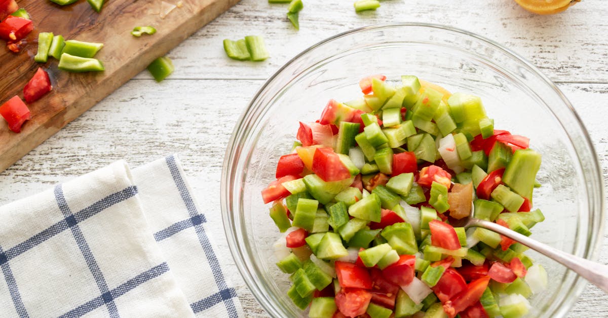 high angle view of a colorful vegetable salad with tomatoes and peppers ready for serving