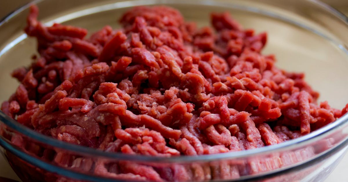 high quality image of fresh ground beef in a glass bowl ideal for culinary and food related themes 22