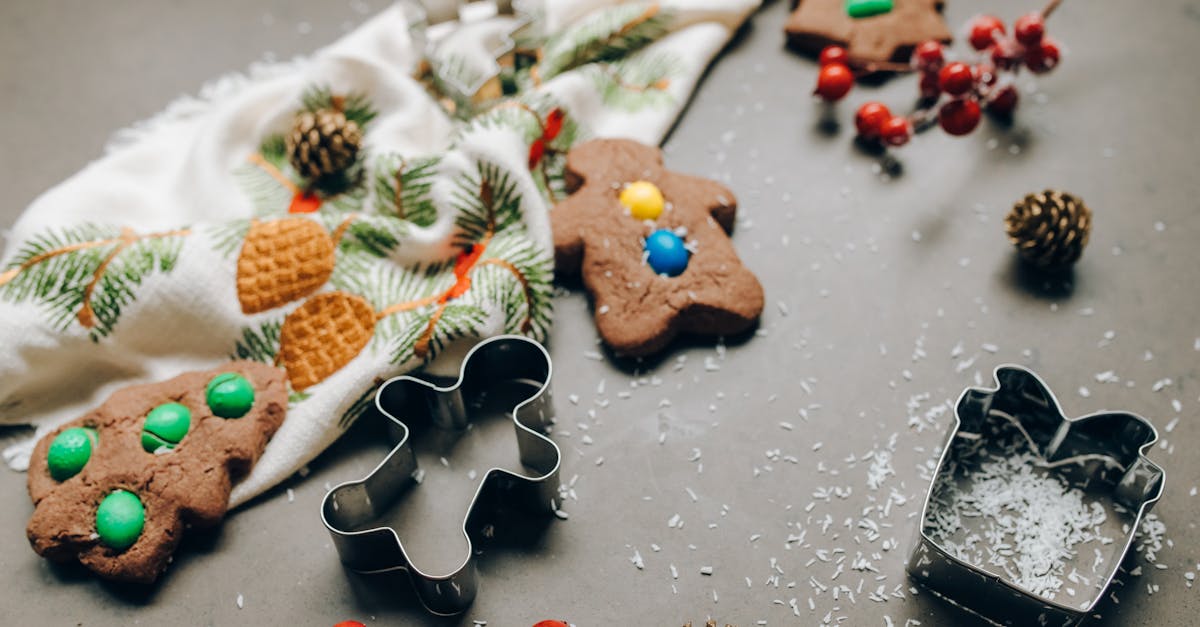 holiday themed gingerbread cookies with coconut flakes and festive decorations on a table 2