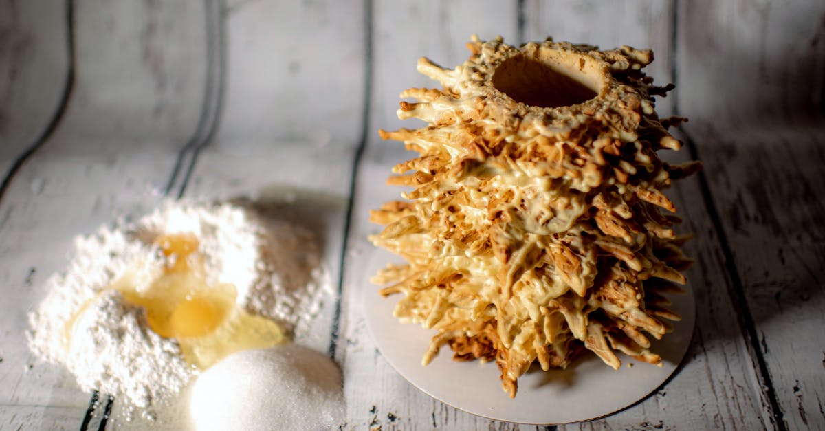 homemade tree cake with eggs and flour showcasing a rustic baking scene