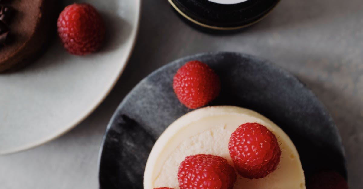 Home indulge in this delectable cheesecake topped with fresh raspberries perfect for dessert lovers