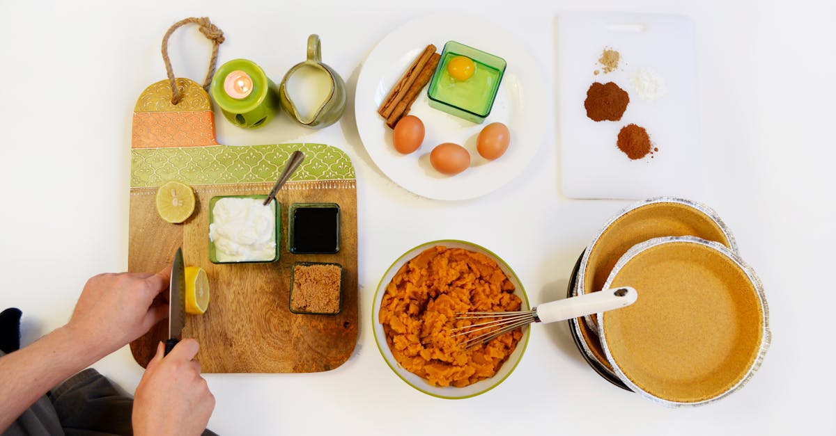 ingredients arranged for pumpkin pie making featuring eggs spices and pastry 2