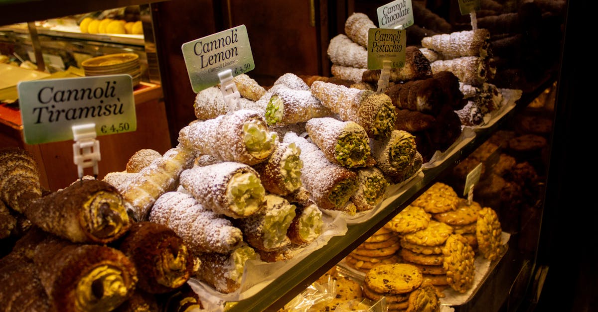 mouthwatering assortment of italian cannoli and pastries on display in a bakery perfect for food lo