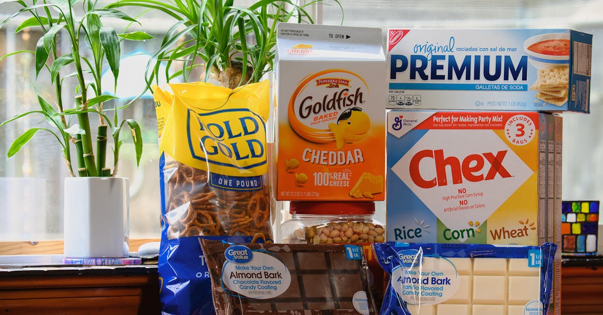 photo of various snack brands including pretzels crackers and candy with potted plants