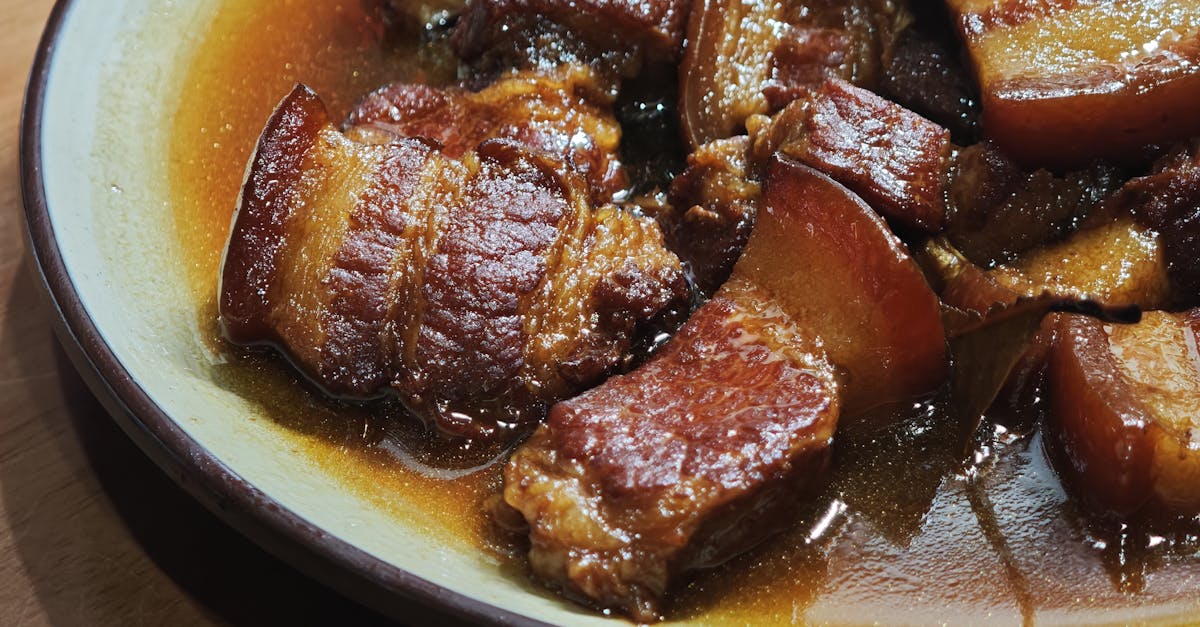 savor the taste of tender braised pork belly in a rich flavorful sauce