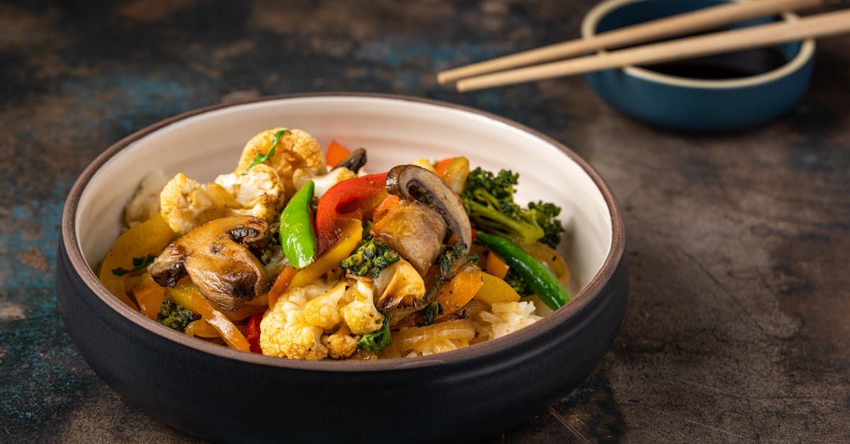 savor this flavorful mixed vegetable dish served with rice in a stylish bowl