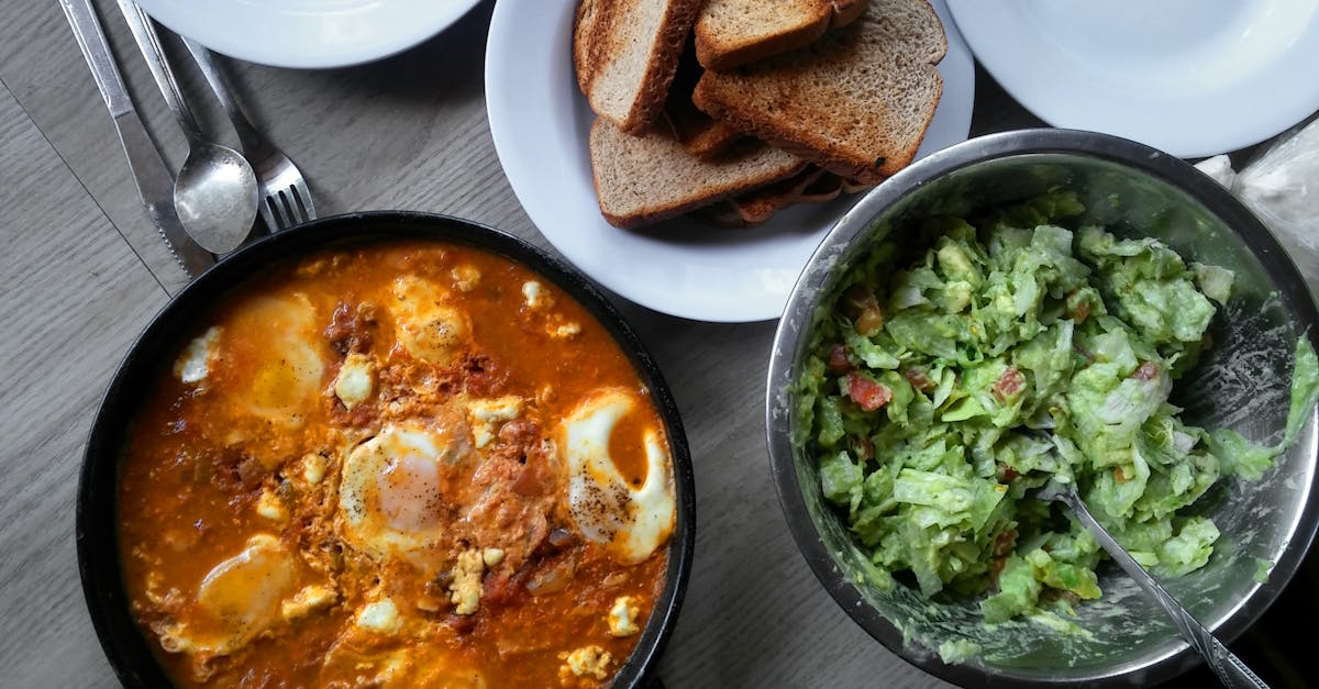 savory shakshuka with toast and salad on a dining table perfect for brunch