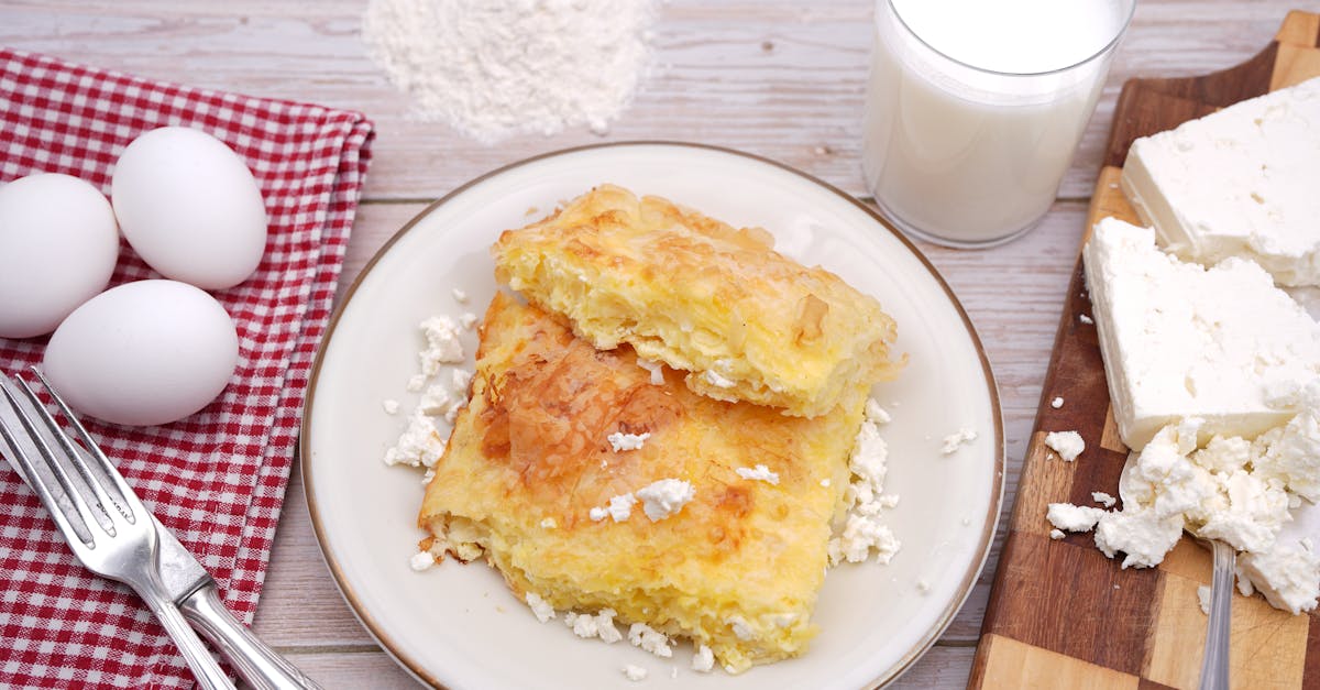 scrumptious homemade pastry served with cottage cheese eggs and milk on a wooden table 2