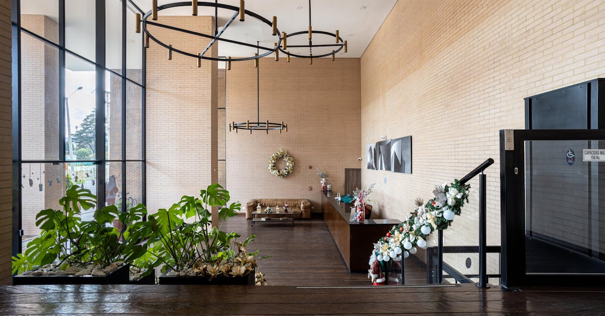 spacious modern lobby in bogota featuring chic furniture plants and contemporary lighting