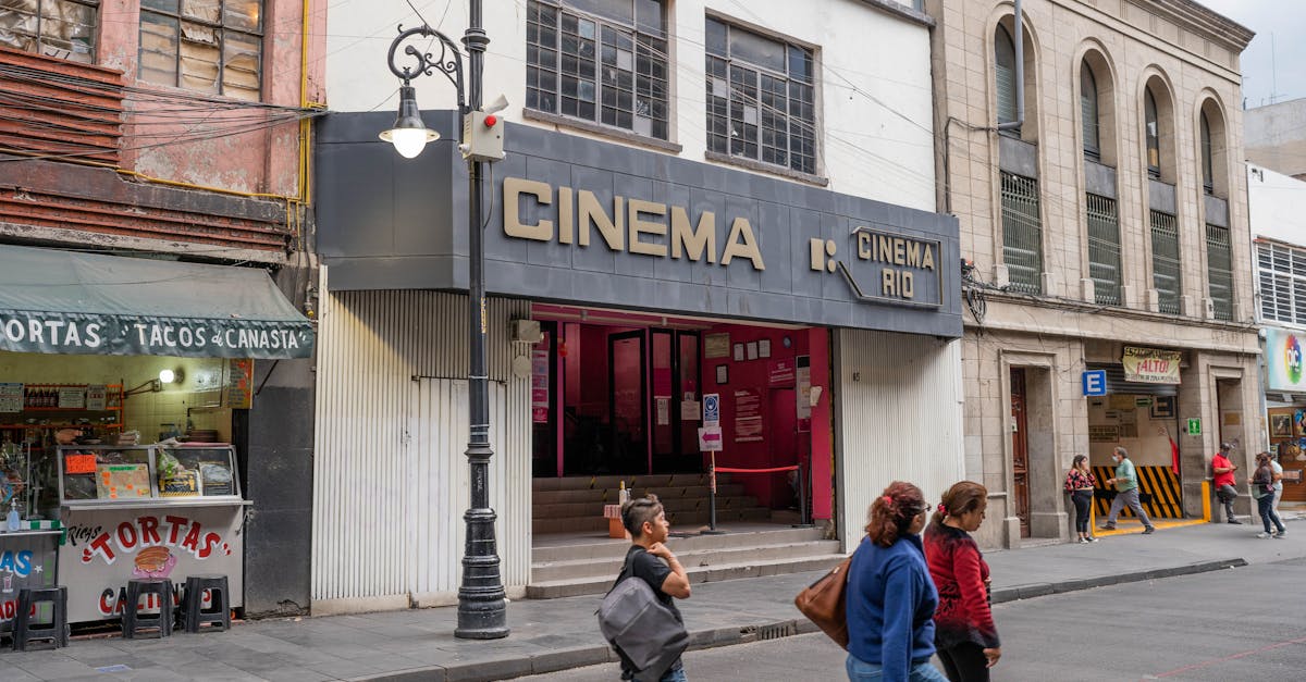 street view showcasing cinema rio and local shops in mexico city s bustling area