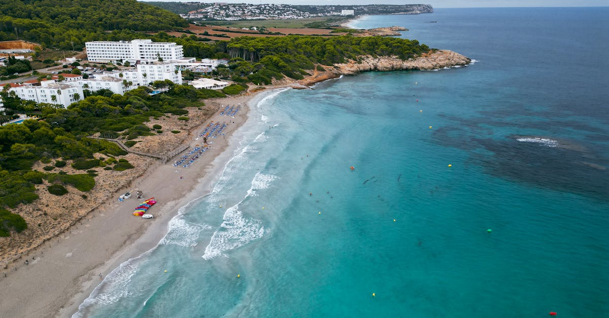 stunning aerial view of sant tomas beach spain showcasing turquoise waters and scenic coastline