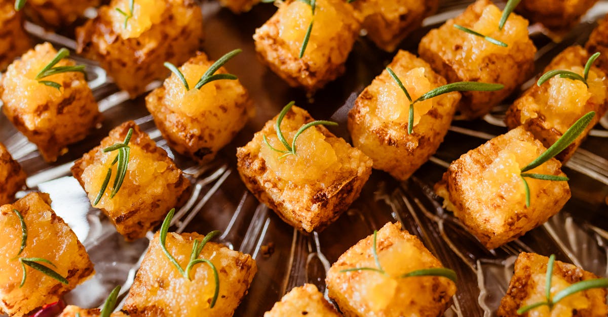 tasty baked tofu cubes garnished with fresh rosemary perfect for vegan parties 18