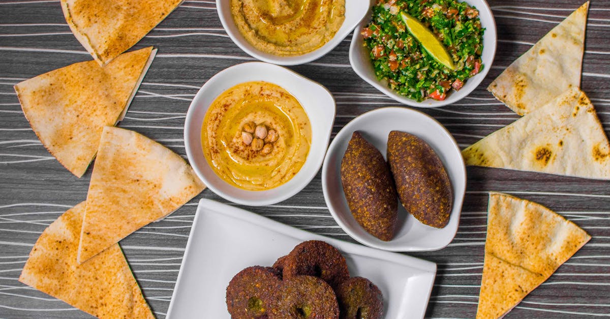 top view of a mouthwatering middle eastern appetizer platter featuring hummus falafel and tabboule