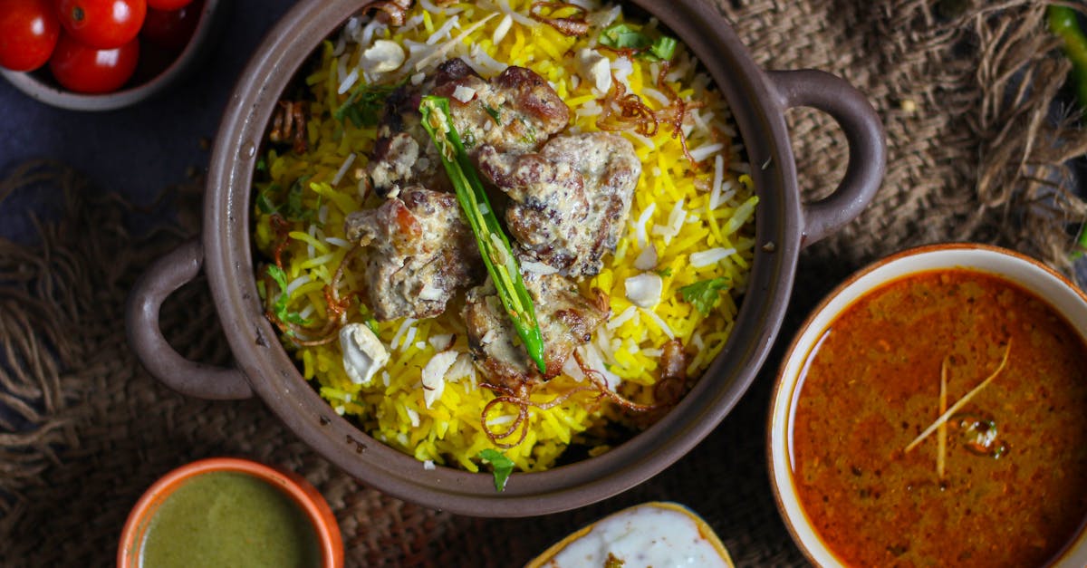 Home top view of authentic biryani with accompaniments a visual feast