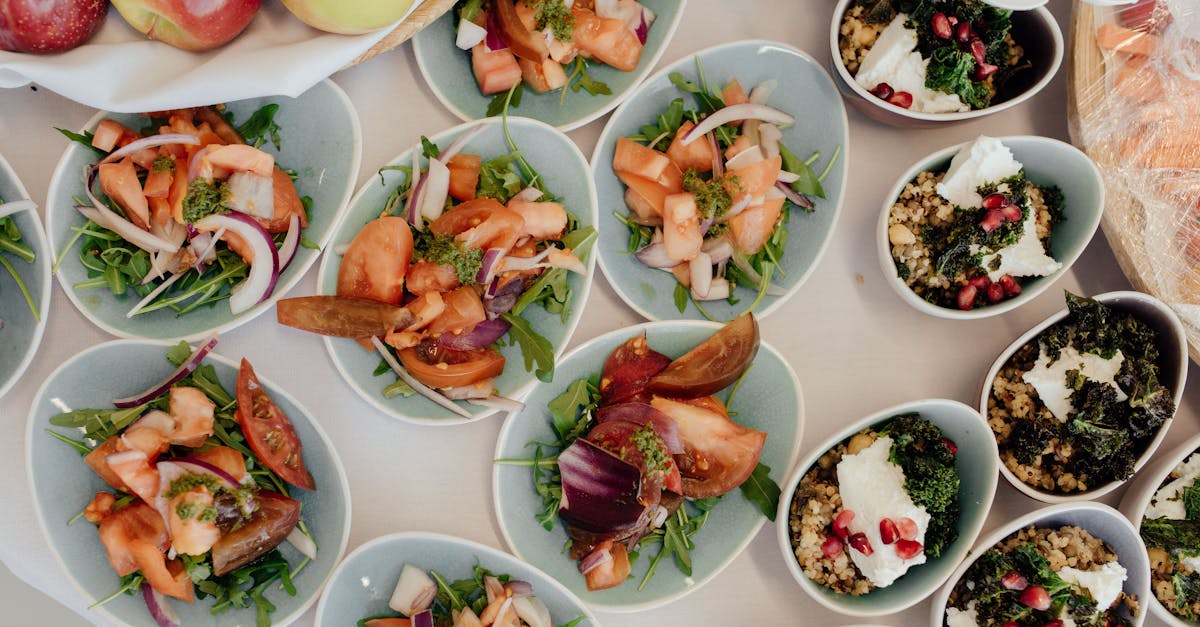 top view of delicious salads with ripe vegetables prepared for breakfast in daytime