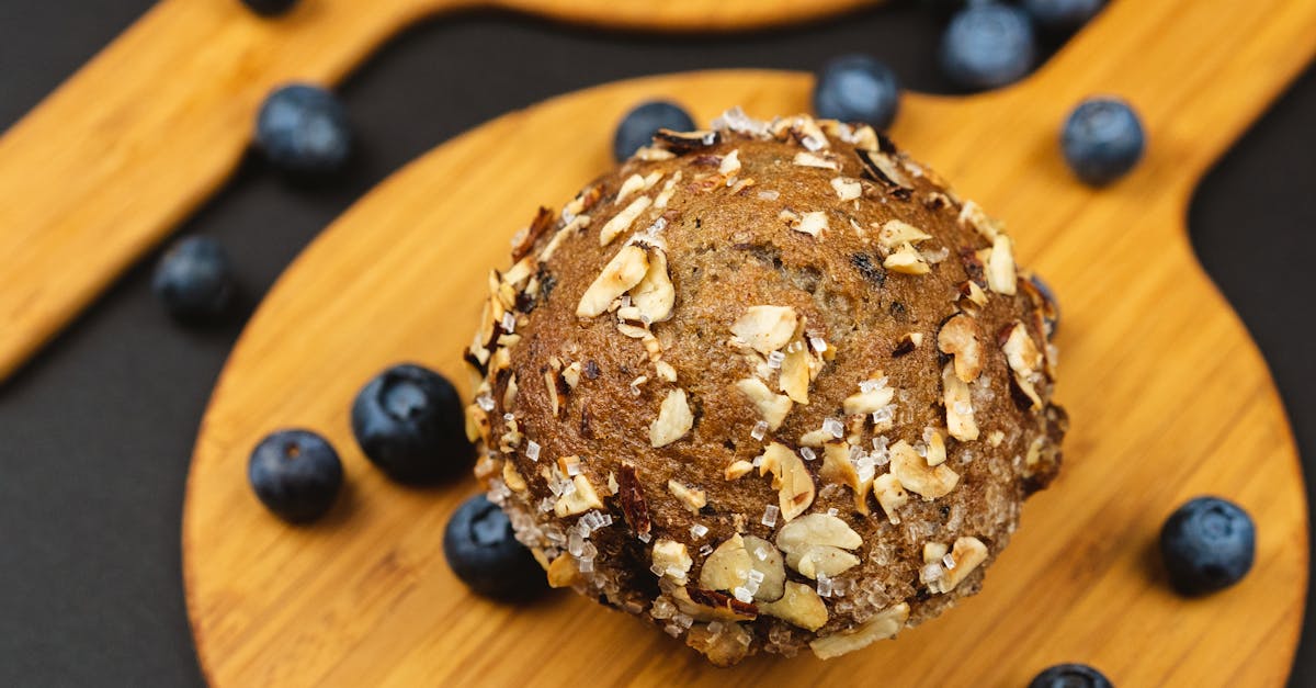 top view of fresh blueberry muffins with oats and scattered blueberries
