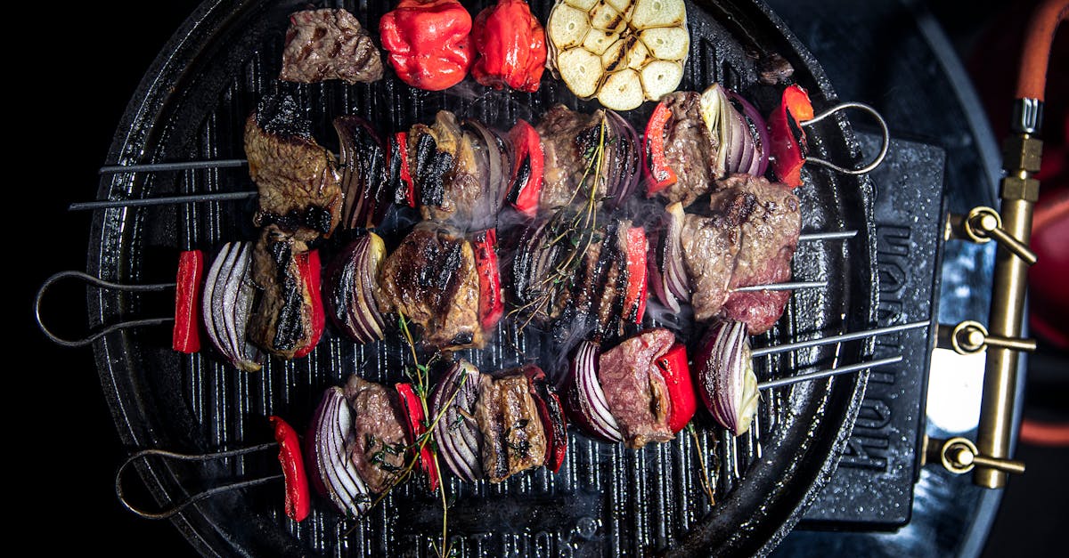 top view of sizzling kebabs with vegetables on a bbq grill perfect for summer cooking