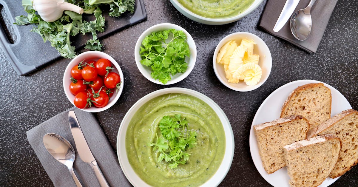 top view of vegetable soup bread and fresh ingredients perfect for a healthy meal