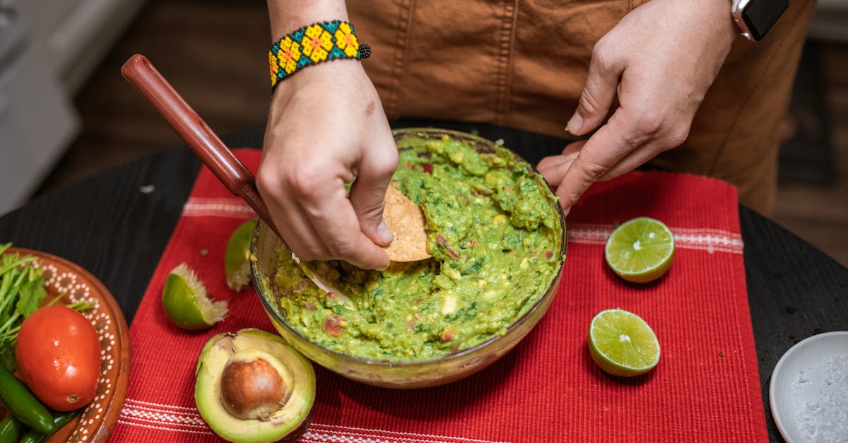vibrant homemade guacamole with tortilla chips ideal for snack or mexican cuisine themes
