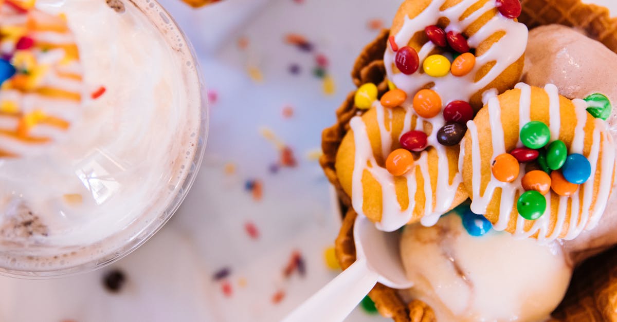vibrant ice cream sundae topped with mini donuts and candies in a waffle bowl 2